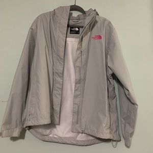 Grey and Pink North face windbreaker